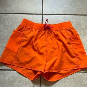 Tek gear orange youth shorts, size large